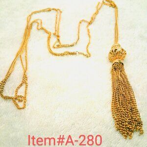 Gold Necklace with a Gold Ball design & cap with Gold tassels,  Item # A-280.